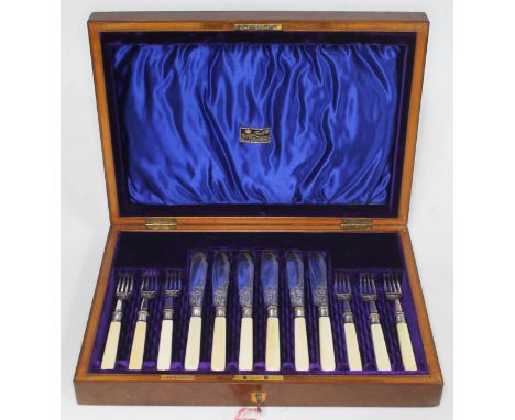 An Edwardian cased set of twelve silver and ivory fish eaters, Levesley Brothers, Sheffield 1902.  