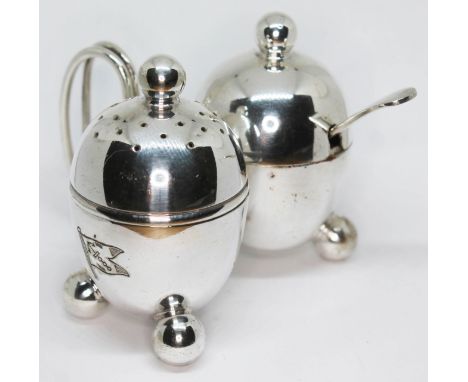 A silver plated cruet with shipping line flag, designed by Christopher Dresser for Elkington &amp; Co.  