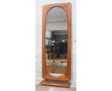 A Danish teak mirror circa 1960s with lower shelf height 140cm.  