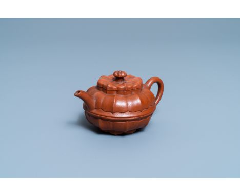 Full title:  A Chinese Yixing stoneware teapot and cover, KangxiDescription: L.: 14 cm - H.: 7,5 cmPlease contact us to let u