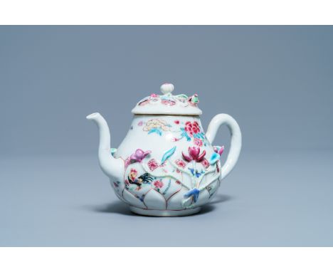 Full title:  A Chinese famille rose relief-decorated teapot and cover, YongzhengDescription: L.: 16 cm - H.: 10,5 cmPlease co