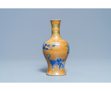 Full title: A Chinese café-au-lait-ground 'dragon and tiger' vase, KangxiDescription: H.: 24 cmPlease contact us to let us kn