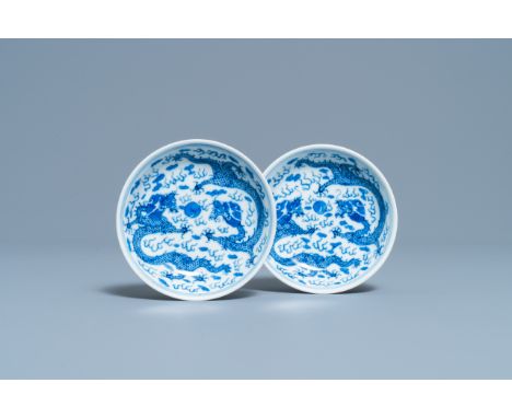 Full title:  A pair of Chinese blue and white 'dragon' saucers, Kangxi mark, 19th C.Description: Dia.: 10 cmPlease contact us
