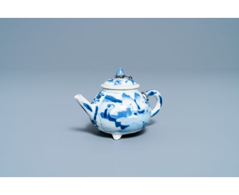 Full title:  A Chinese blue and white tripod teapot with figures in a landscape, KangxiDescription: L.: 13 cm - H.: 8,5 cmPle