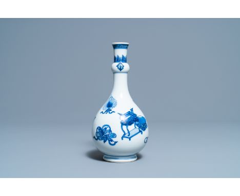 Full title:  A Chinese blue and white 'antiquities' bottle vase, KangxiDescription: H.: 21,5 cmPlease contact us to let us kn