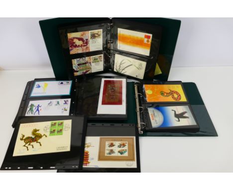 Philately - A collection of Chinese mint stamps, first day covers and pre-stamped postcards. [W]