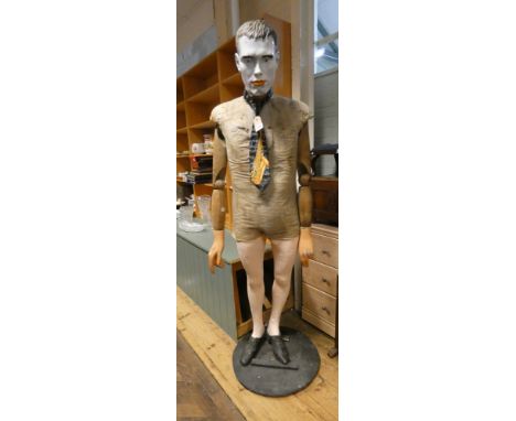 A early painted wooden and fabric bodied life sized mannequin 