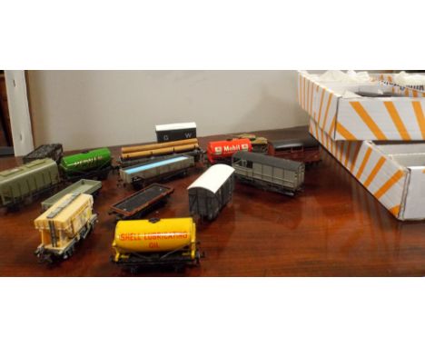 Two boxes of assorted model railway tenders, carriages, petrol tanks, tanks etc 