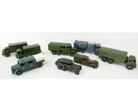 Collection of eight vintage Dinky military army trucks and wagons, Nos 621, 642, 689 etc 