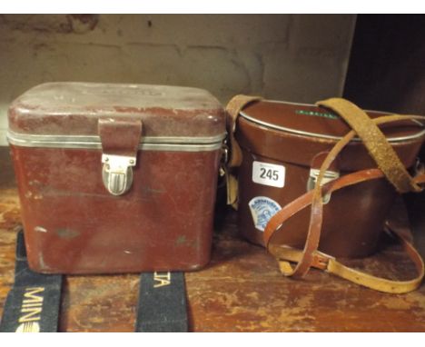 235mm cameras, a Eumig cini-camera and a pair of binoculars - make PC Ballie , model number 067667