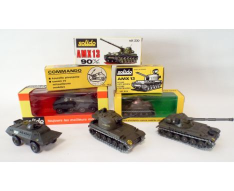 A group of three Solido military vehicles, mint and boxed 