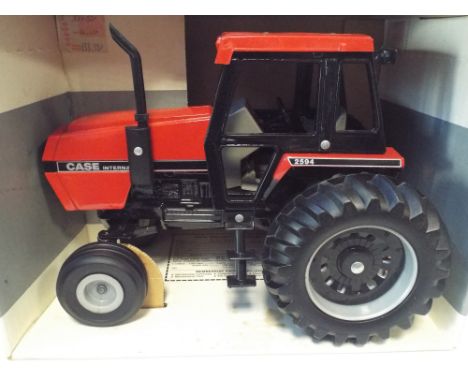 ERTL Case International 1:16 scale tractor and cab, mint and boxed