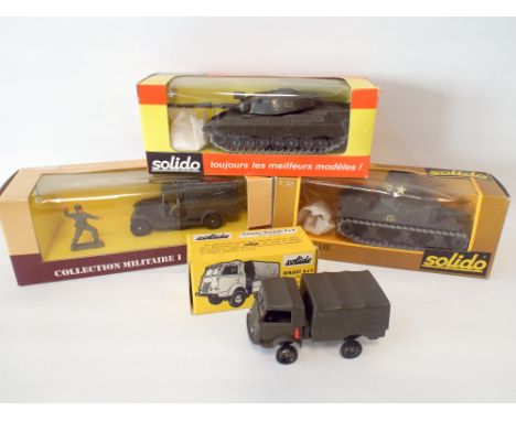Four boxed Solido military vehicles to include tanks, mint and boxed 