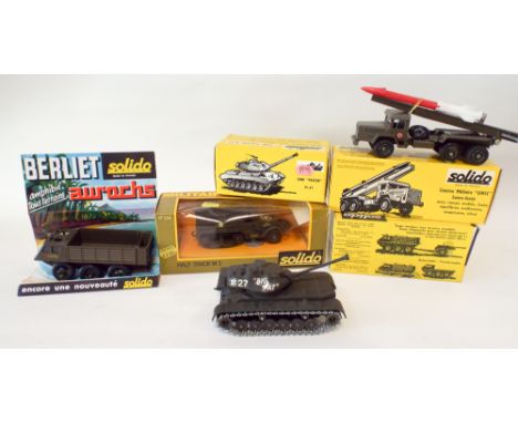 A group of five vintage Solido die-cast military vehicles and tanks mint and boxed 