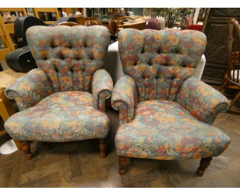A pair of buttoned back Victorian style occasional chairs in a tapestry style fabric 