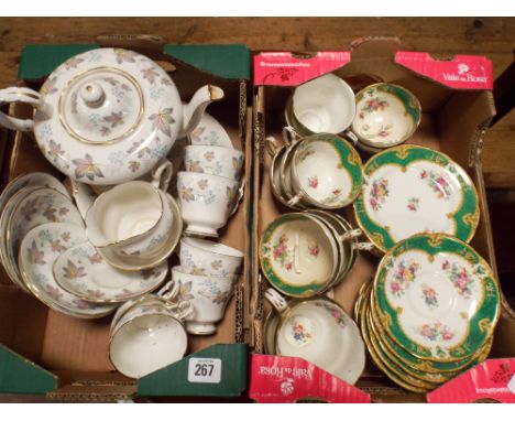 A Paragon leaf decorated china tea set and a green bordered and floral china tea set      Green Tea Set - 2 cups have missing