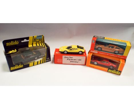 Selection of four Solido toy cars - a Jaguar XJ12 No43, Maserati Indy No185, Ferrari BB No44, and a Ferrari BB in yellow (unb