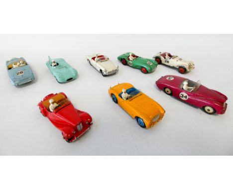 Group of eight Dinky toy vintage cars to include Nos 108, 107, 113, 110 etc. Played with condition 