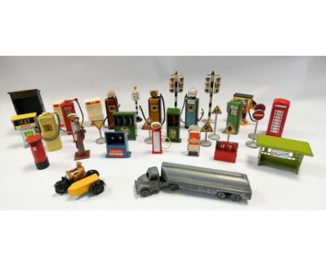 Collection of Dinky and Corgi vintage petrol pumps, road signs, telephone box, traffic lights etc  