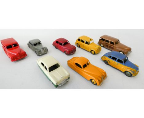 Collection of eight vintage Dinky cars, No 27F, 40J, 344 etc. Played with condition 