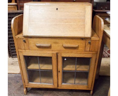 Light oak bureau cabinet fitted drawer with lead light doors under 