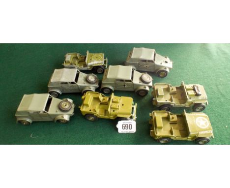 Collection of eight vintage Dinky armored trucks and wagons to include a Volkswagon Kof etc. Played with condition 