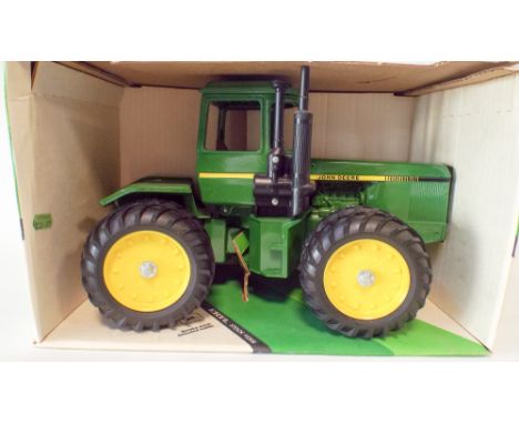 An ERTL John Deere four wheel drive tractor mint and boxed 