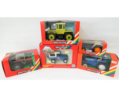 Group of five Britain's 1:32 scale tractors and Land Rovers, mint and boxed 