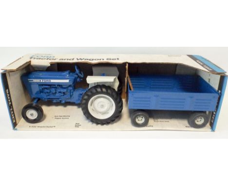 ERTL Ford tractor and wagon set, mint and boxed