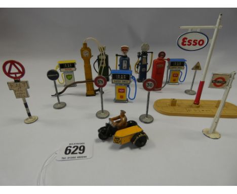 Collection of Dinky vintage and Corgi petrol pumps and road signs, and a Dinky AA Assistance motorbike and side car 
