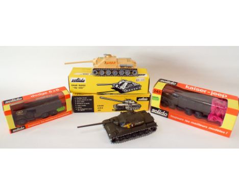A collection of four vintage Solido military vehicles to include jeeps and tanks 