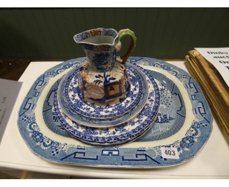 Davenport iron stone jug and a collection of blue and white plates together with a copy of Gaudeamus and sheet music 