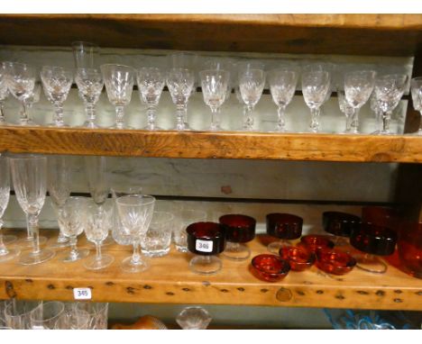 Large quantity of cut glass, drinking glasses, ruby glass, decanters etc 