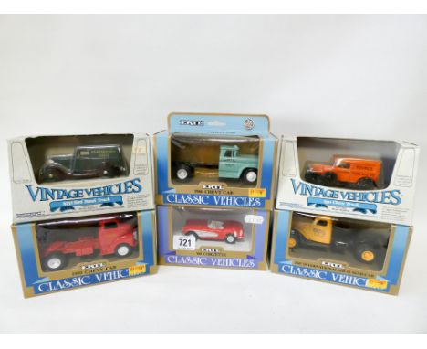 Collection of six ERTL mint boxed Diecast metal replica toys, 1:43 scale 