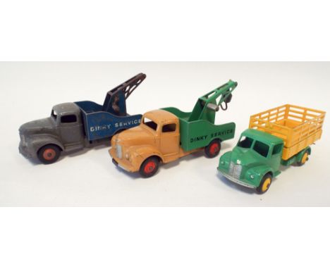 Vintage Dinky Commer recovery van in blue and grey, another in green and buff and a Dinky Dodge. Lightly played with conditio