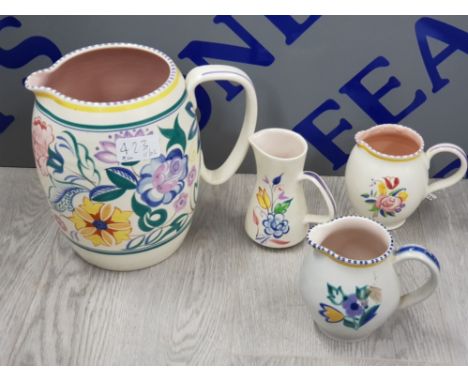 4 VARIOUS POOLE POTTERY HAND PAINTED JUGS WITH BEAUTIFULLY DECORATED FLORAL PATTERNS