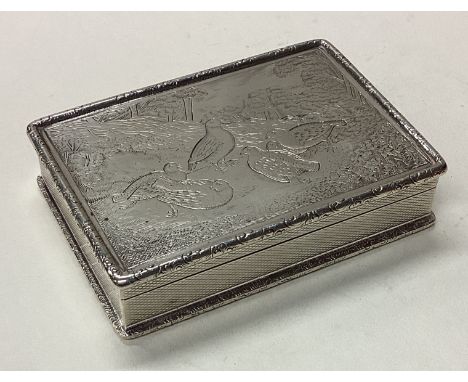 A cast silver snuff box engraved with birds and trees. Birmingham 1923. By Sampson Mordan. Approx. 176 grams. Est. £300 - £40