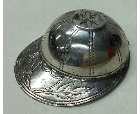 A silver caddy spoon in the form of a jockey cap. Birmingham 1787. By Joseph Taylor. Approx. 8 grams. Est. £300 - £400.