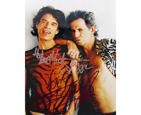 The Rolling Stones  - Colour photograph of Mick Jagger and Keith Richards signed by each artist, 10" x 8"