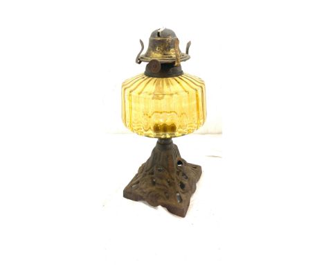 Antique cast base oil lamp, approximate height 12 inches 