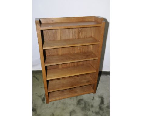 Oak Robert Thompson 'Mouseman' four tier adjustable height open bookcase with raised back & sides (83.5cm x 26cm x 122cm)