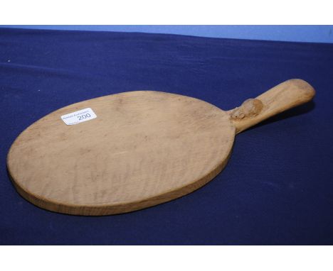 Oak Robert Thompson 'Mouseman' bread board of oval form