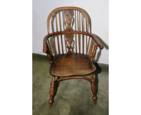 19th C yew wood and elm stick back Windsor armchair with pierced central splat with crinoline under stretcher and turned supp