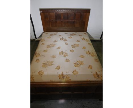 Robert Thompson 'Mouseman' 1960s oak 4ft 6" double bedstead with panelled detail 