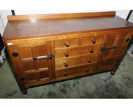 Robert Thompson 'Mouseman' 1960s oak 5ft sideboard with raised back and adzed top above two short and three long central draw