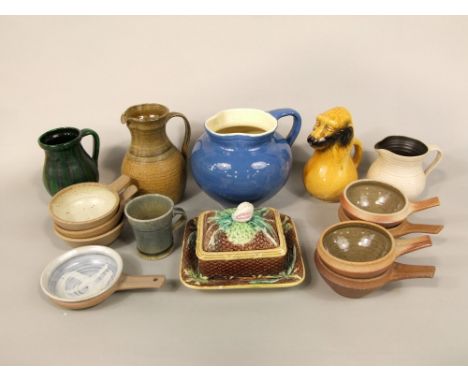 A collection of studio pottery wares including four Mulcheney Leach pottery single handled bowls, three further similar Winch
