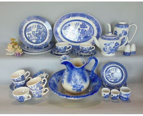 A collection of blue and white printed Willow pattern wares including a Myott Old Willow coffee pot, Barrats tea pot, etc, to