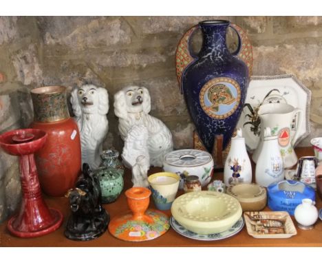 A quantity of ceramics including a late 19th century Doulton vase with brick red ground and gilt detail, a black glazed Jackf