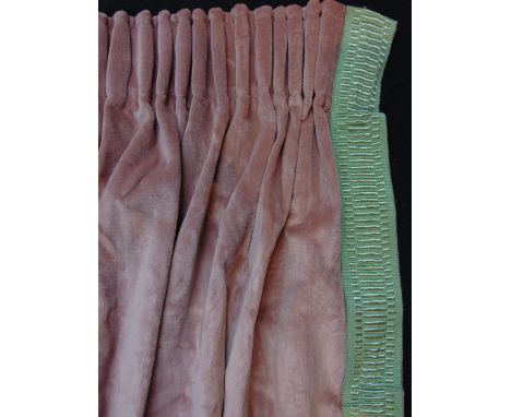 Three extra long lined curtains in soft pink velvet with green braid stripe on long edges and pencil pleat heading, approx 3.