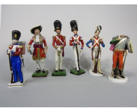 A collection of five continental ceramic models of soldiers including Sitzendorf examples of a Grenadier Guard and an officer